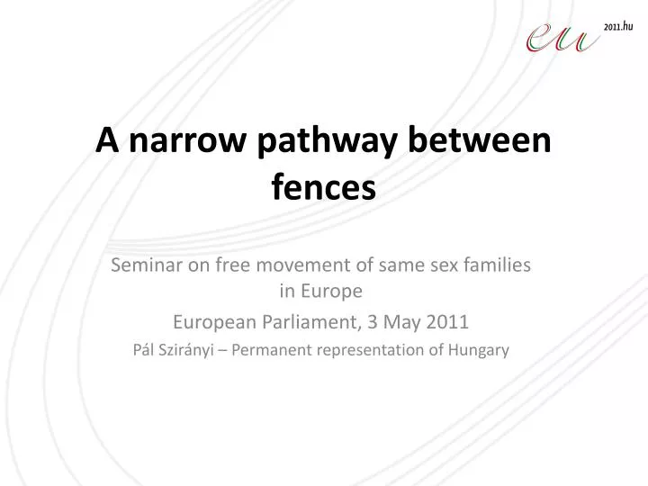 a narrow pathway between fences