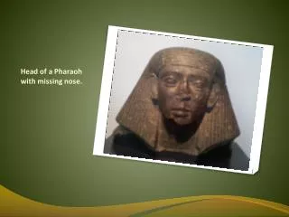 Head of a Pharaoh with missing nose.