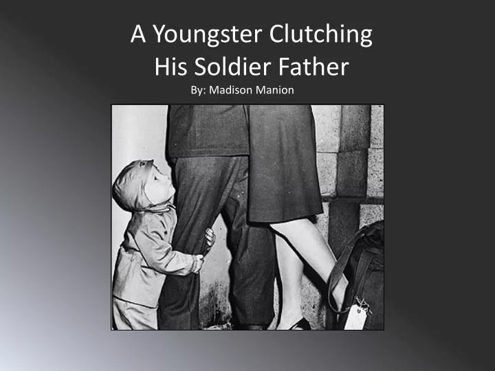 a youngster c lutching his s oldier father