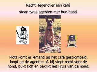 Recht tegenover een café staan twee agenten met hun hond
