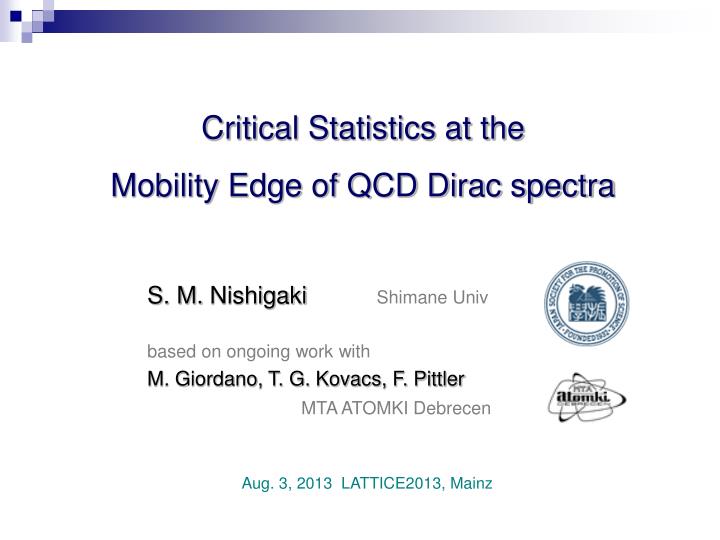 critical statistics at the mobility edge of qcd dirac spectra